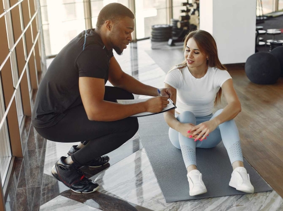 trainer talking to student